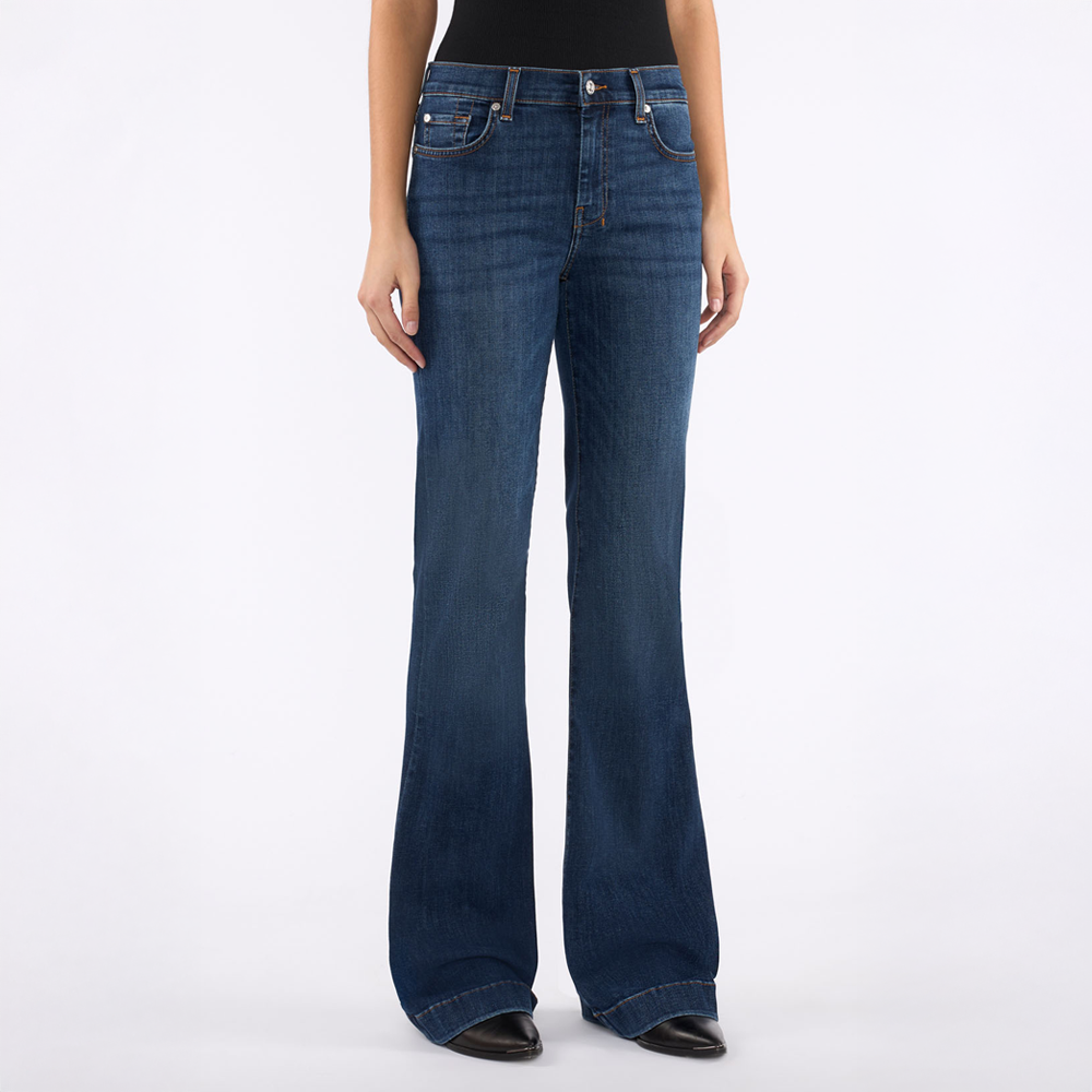 DOJO Andover Blue jeans worn by a person on a white background
