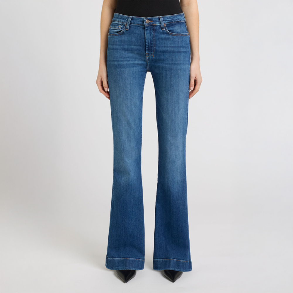 DOJO Moonwater Blue flared jeans on a white background