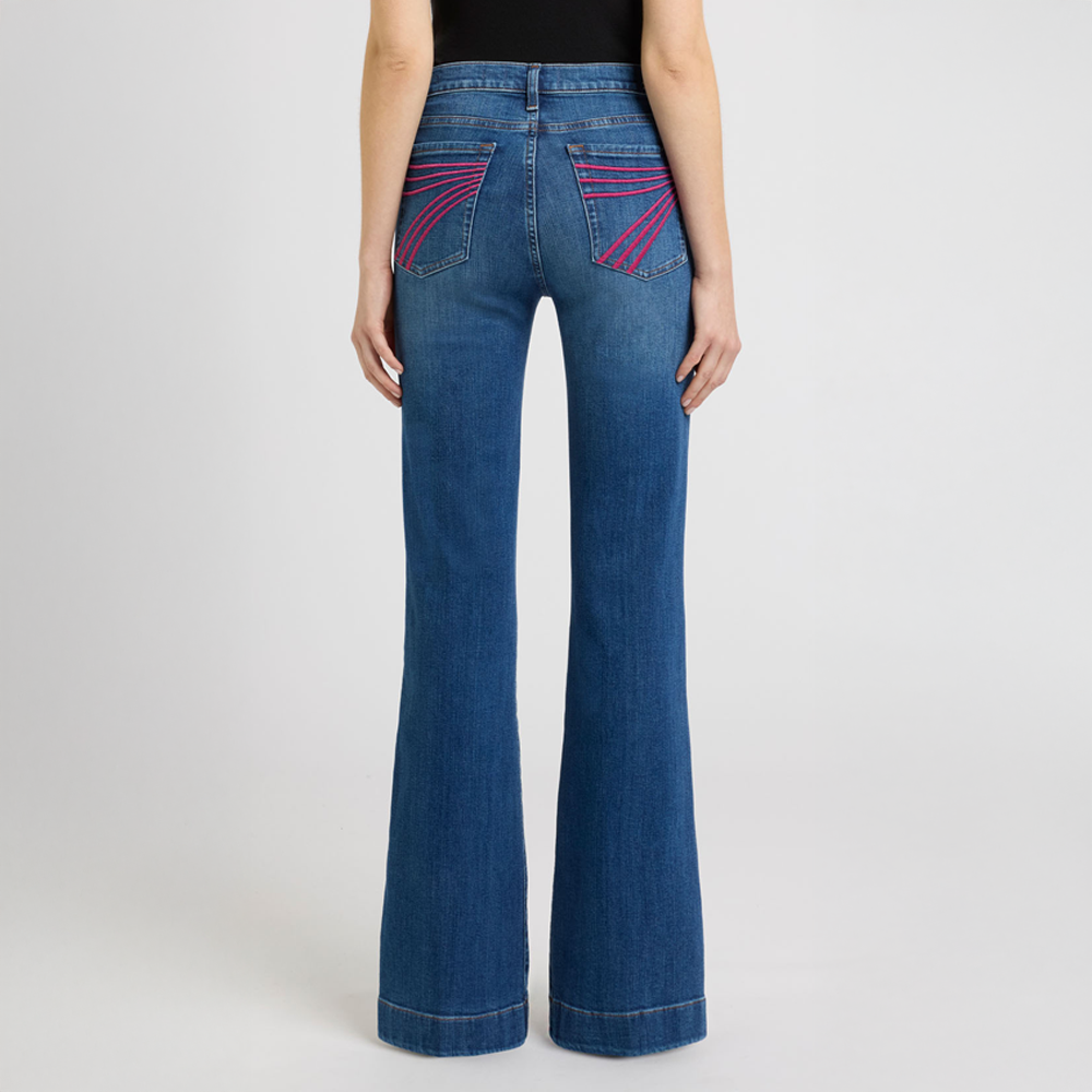 DOJO Moonwater Blue jeans with pink stitching on a white background