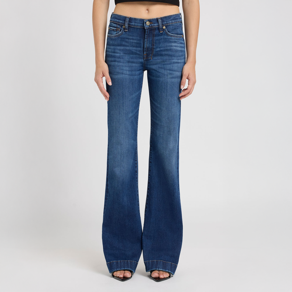 Loom Blue flared jeans on a white background